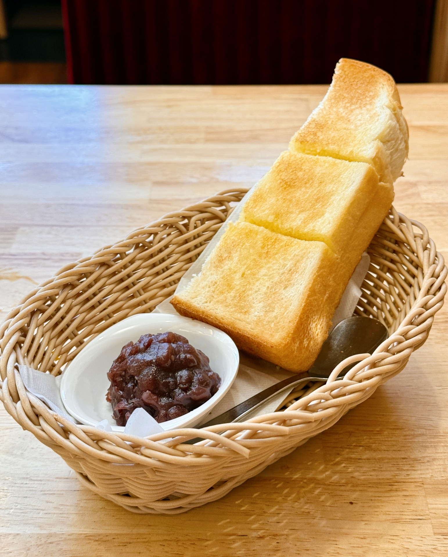 Shokupan toast served with traditional Japanese sweet red bean paste, representing a harmonious blend of Japanese and Western culture.