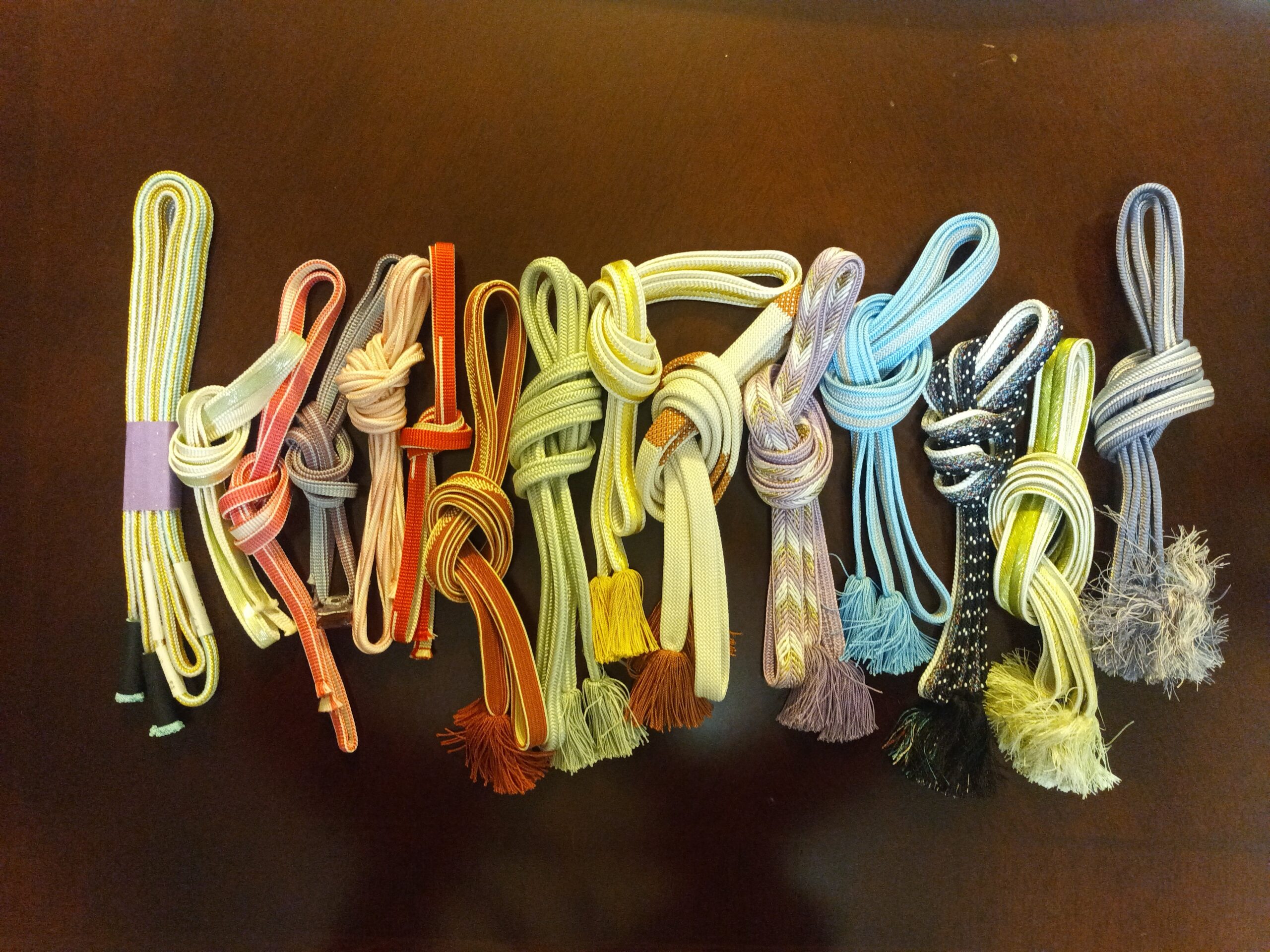 Collection of colorful traditional Japanese obijime kumihimo cords